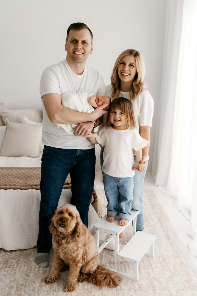 Family photo in neutral tones and natural light. 