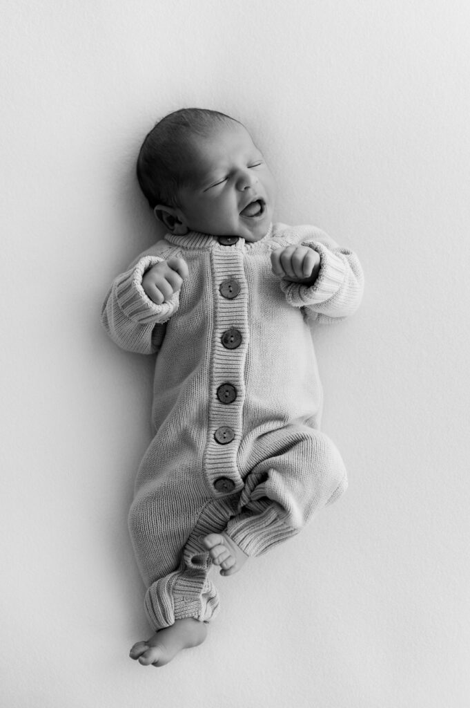 Black and white photo of a newborn 