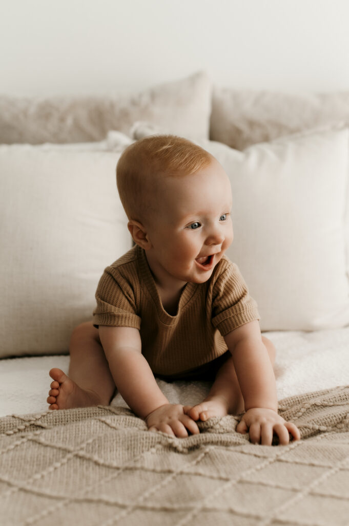 Sweet smiling little girl at her siting session