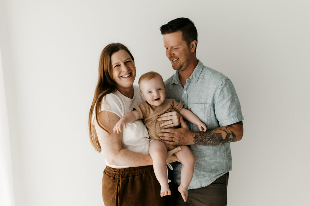 Family being playful together as their studio session. 